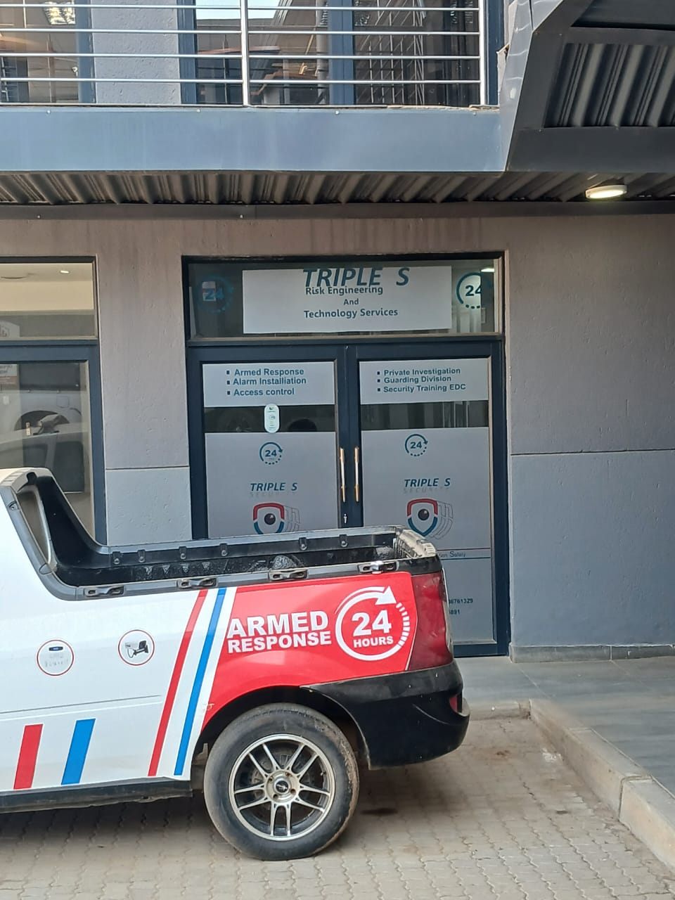 Triple S Security armed-response vehicle outside the office
